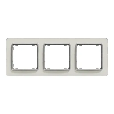 Ramka potrójna Schneider Sedna Elements SDD360803 w kolorze białym, wykonana ze szkła, z metalicznym wykończeniem wokół otworów.