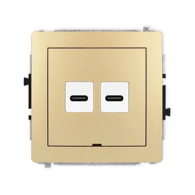 Gniazdo podwójne Karlik DECO z dwoma portami USB-C w kolorze złotym, idealne do nowoczesnych wnętrz.