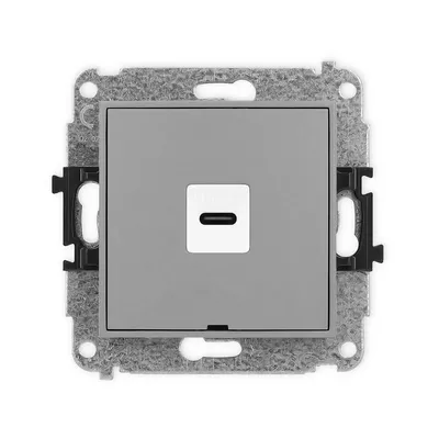 Gniazdo pojedyncze USB-C Szary mat Karlik MINI z metalową ramką montażową i czarnymi zaczepami.
