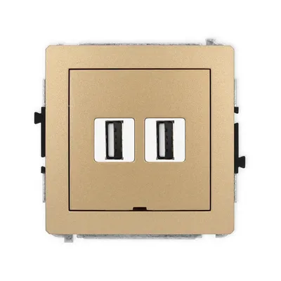 Podwójne gniazdo USB-A 2.0 Karlik DECO w kolorze złotego metaliku, z dwoma portami USB do ładowania urządzeń.