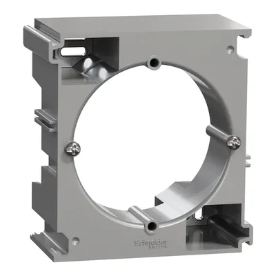 Podstawa natynkowa rozszerzająca Schneider Sedna Design SDD113902 wykonana ze srebrnego aluminium, z widocznym logo producenta.