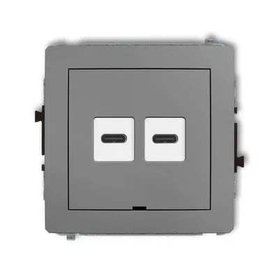 Podwójna ładowarka USB typu C Karlik DECO w kolorze szarym matowym z dwoma portami szybkiego ładowania.