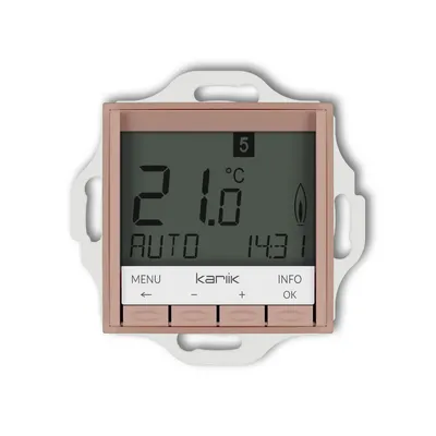 Elektroniczny regulator temperatury Karlik ICON w kolorze łososiowym, z niebieskim podświetleniem i cyfrowym wyświetlaczem pokazującym 21.0°C.
