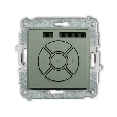 Elektroniczny sterownik roletowy Karlik ICON w kolorze szałwiowym, z przyciskami sterującymi i gniazdami przyłączeniowymi.