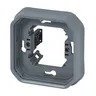 Szara ramka pojedyncza podtynkowa Legrand Nowe Plexo IP55 069682L, do montażu natynkowego, z uchwytami.