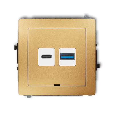 Złota podwójna ładowarka USB typu A+C 30W Karlik DECO z portem USB-C i USB-A, idealna do nowoczesnych wnętrz.