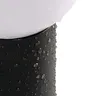 Antracytowa oprawa ogrodowa Kanlux STONO z kroplami wody, podkreślająca jej odporność na warunki atmosferyczne.