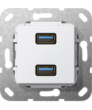 Podtynkowe gniazdo z portami USB Gira do ładowania urządzeń.